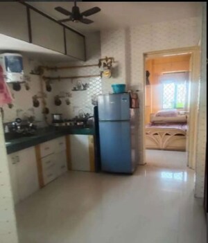 Kitchen in 2 BHK Apartment at Adajan – for Sale