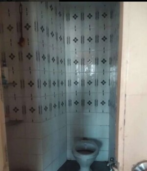 Bathroom in 2 BHK Apartment at Adajan – for Sale