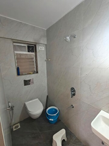Bathroom in 2 BHK Apartment at Shraddha Evoque, Bhandup West – for Rent