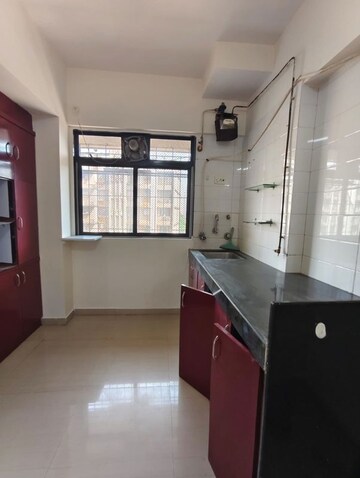 Kitchen in 1 BHK Apartment at Unnatti Greens Phase VII, Ghodbunder Road – for Rent