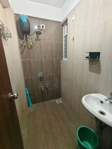 Bathroom in 1 BHK Apartment at KIPL Morya, Kasarvadavali – for Rent