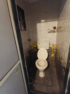 Bathroom in 1 BHK Apartment at Bimbisaar Nagar CHS, Goregaon East – for Rent