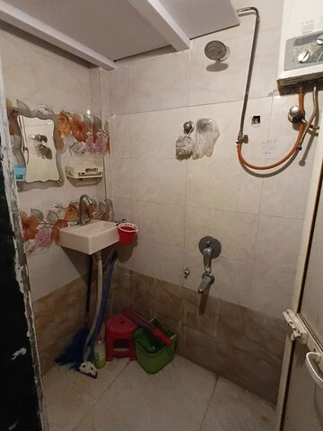 Bathroom in 1 BHK Apartment at Bimbisaar Nagar CHS, Goregaon East – for Rent