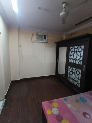 Bedroom in 1 BHK Apartment at Bimbisaar Nagar CHS, Goregaon East – for Rent