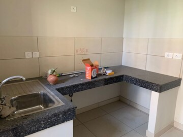 Kitchen in 2 BHK Apartment at Tata Eureka Park, Sector 150 – for Rent