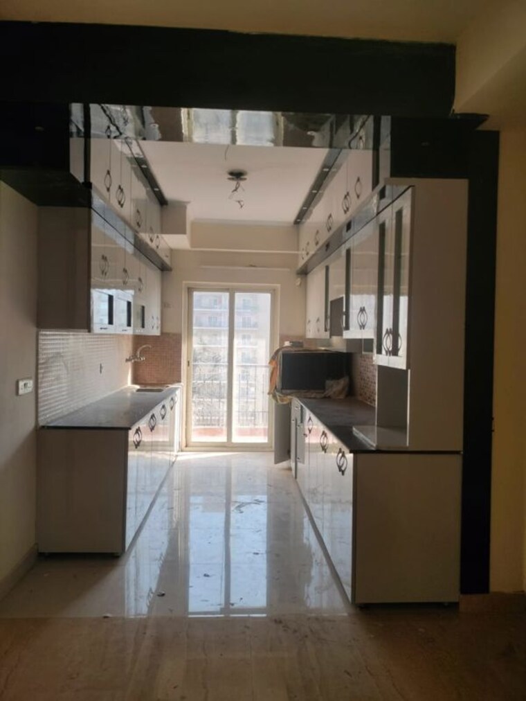 Kitchen, maxblis-grand-wellington 3 Bedroom 2050 Sq.Ft. Apartment In Sector 75 Noida 10115473