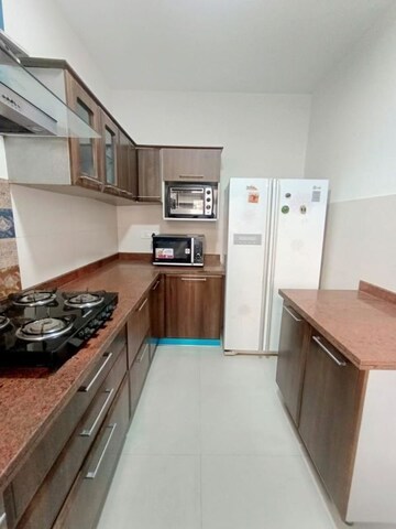 Kitchen in 3 BHK Apartment at Emaar MGF Emerald Hills, Sector 65 – for Rent