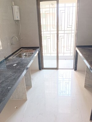 Kitchen in 1 BHK Apartment at Regency Antilia Phase V Avana, Ulhasnagar – for Sale