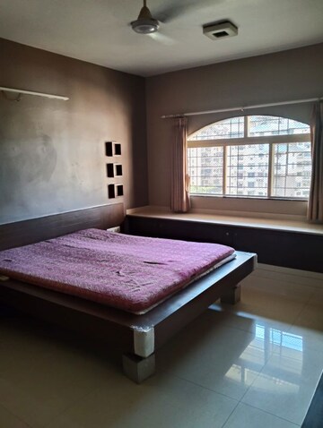 Bedroom in 2 BHK Apartment at NRI Complex Phase I, Seawoods Sector 58 – for Rent