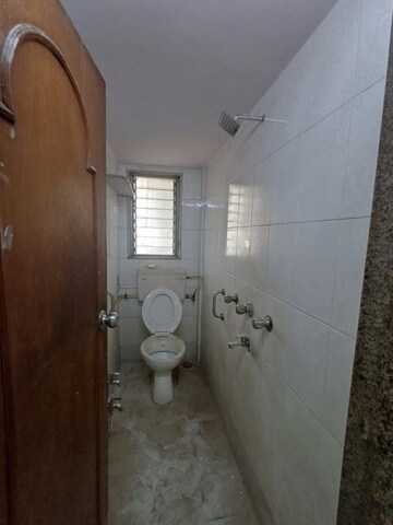 Bathroom in 2 BHK Apartment at Sutra Vihar, Naupada – for Rent