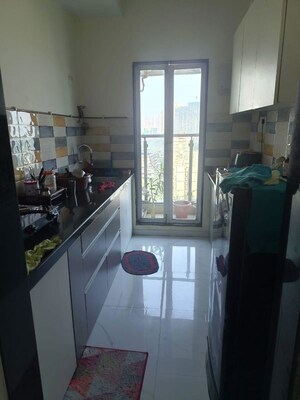 Kitchen in 1 BHK Apartment at Siddhi Highland Haven Phase 2, Balkum Pada – for Rent