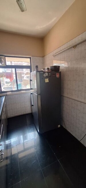 Kitchen in 3 BHK Apartment at Patel Palace, Andheri East – for Sale