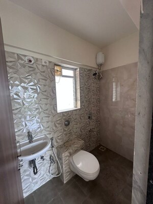 Bathroom in 2 BHK Apartment at Raunak Laxmi Narayan Residency, Pokhran Road No Two – for Rent