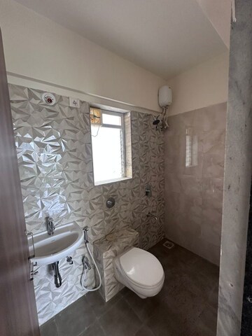 Bathroom in 2 BHK Apartment at Raunak Laxmi Narayan Residency, Pokhran Road No Two – for Rent