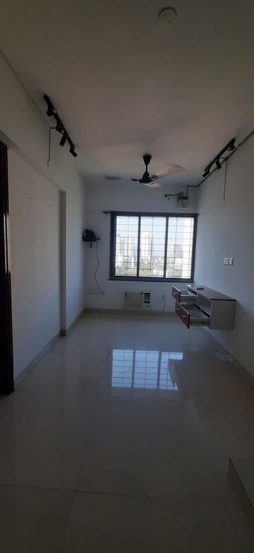Living Room in 1 BHK Apartment at Lodha Crown Quality Homes, Majiwada – for Rent