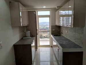 Kitchen in 2 BHK Apartment at Suncity Avenue 76, Sector 76 – for Rent