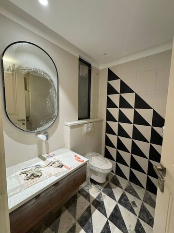 Bathroom in 4 BHK Builder Floor at Ansal API Esencia, Sector 67 – for Sale