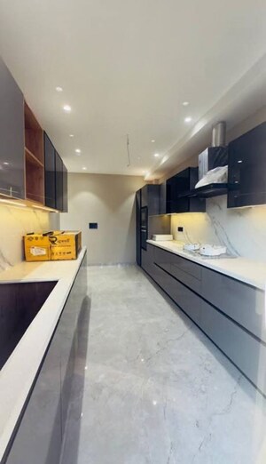 Kitchen in 4 BHK Builder Floor at Auram Floor, South City 2 – for Sale