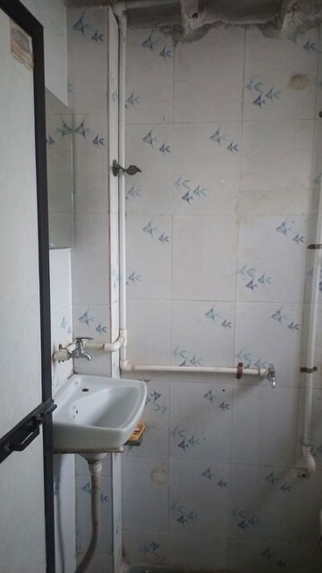 Bathroom in 2 BHK Apartment at Vikas Ritz, Khadakpada – for Sale