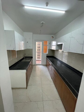 Kitchen in 3.5 BHK Apartment at Rishita Mulberry Heights, Sushant Golf City – for Rent