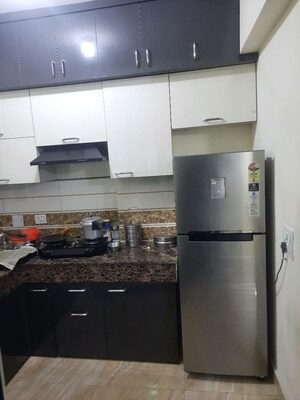 Kitchen in 3 BHK Apartment at ABA Coco County, Sector 10 Greater Noida – for Rent