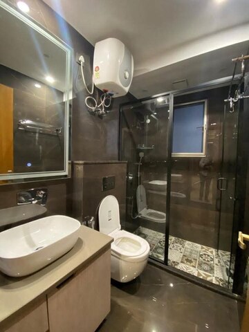 Bathroom in 2 BHK Apartment at Ambience Creacions, Sector 22 – for Rent