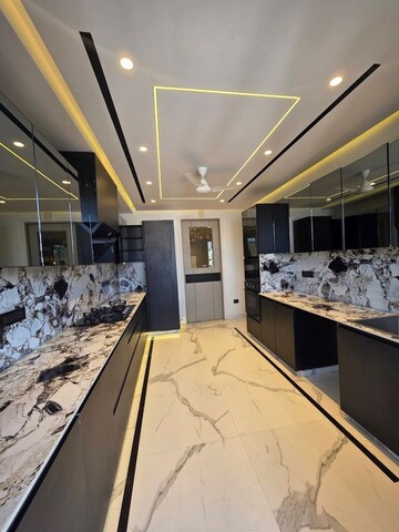 Kitchen in 2.5 BHK Apartment at Ambience Creacions, Sector 22 – for Rent