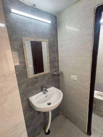 Bathroom in 1 BHK Apartment at Amrapali Dream Valley, Tech Zone 4 Greater Noida – for Rent