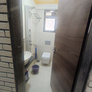 Bathroom in 1 BHK Apartment at Shreedham Splendour, Andheri West – for Rent