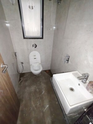 Bathroom in 3 BHK Apartment at Neminath Silver Oak, Andheri West – for Rent