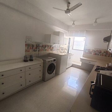 Kitchen in 4 BHK Apartment at Rustomjee 9 JVPD, Juhu – for Rent