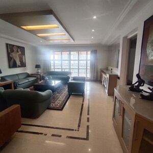 Living Room in 4 BHK Apartment at Rustomjee 9 JVPD, Juhu – for Sale