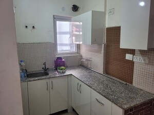 Kitchen in 1 BHK Apartment at Aditya Celebrity Homes, Sector 76 – for Rent