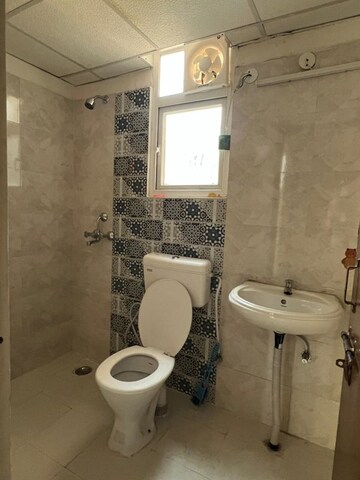 Bathroom in 2 BHK Apartment at Signature Global Proxima, Sector 89 – for Rent