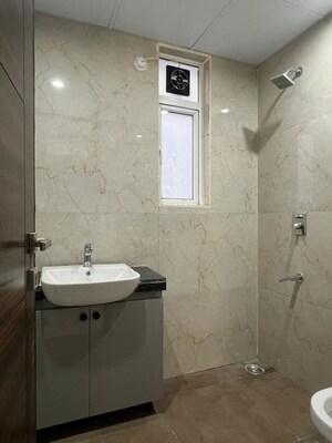 Bathroom in 2.5 BHK Builder Floor at Smart World Gems, Sector 89 – for Rent