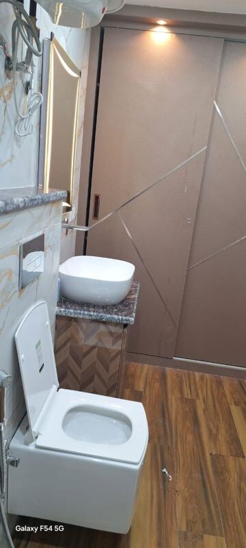 Bathroom in 4 BHK Builder Floor at Palam Vihar Residents Association, Palam Vihar – for Rent