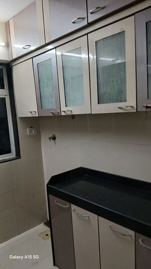 Kitchen in 4 BHK Apartment at Lodha Woods, Kandivali East – for Rent