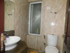 Bathroom in 3 BHK Apartment at Amrapali Heartbeat City, Sector 107 – for Rent