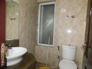 Bathroom in 3 BHK Apartment at Amrapali Heartbeat City, Sector 107 – for Rent