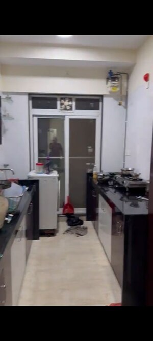 Kitchen in 2 BHK Apartment at Alliance Bhaskar, Malad West – for Rent