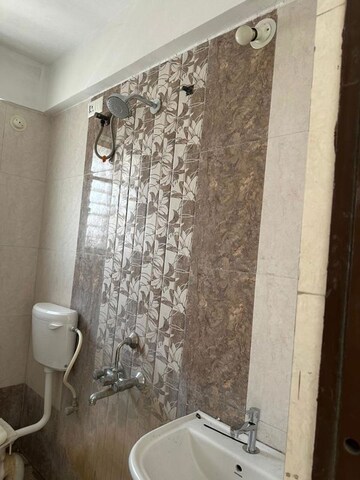 Bathroom in 2 BHK Apartment at Supertech Defence Colony Phase II, Wagholi – for Rent