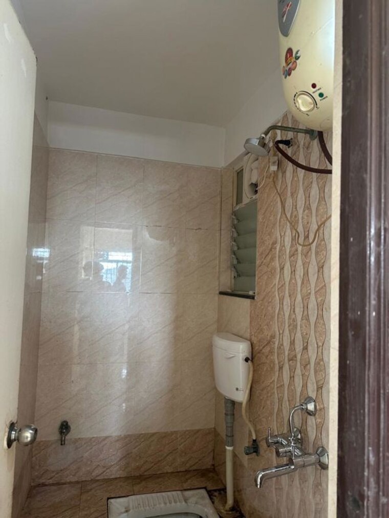 Bathroom, supertech-defence-colony-phase-ii 2 Bedroom 753 Sq.Ft. Apartment In Wagholi Pune 10116258