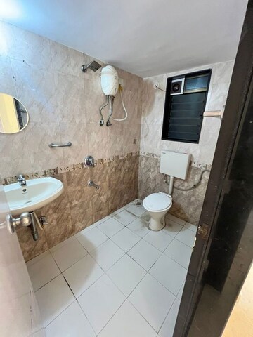 Bathroom in 2 BHK Apartment at Sheth Heights, Chembur – for Rent