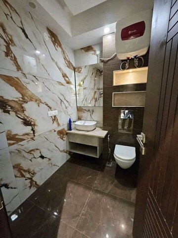 Bathroom in 3 BHK Apartment at Smart World Orchard, Sector 61 – for Sale