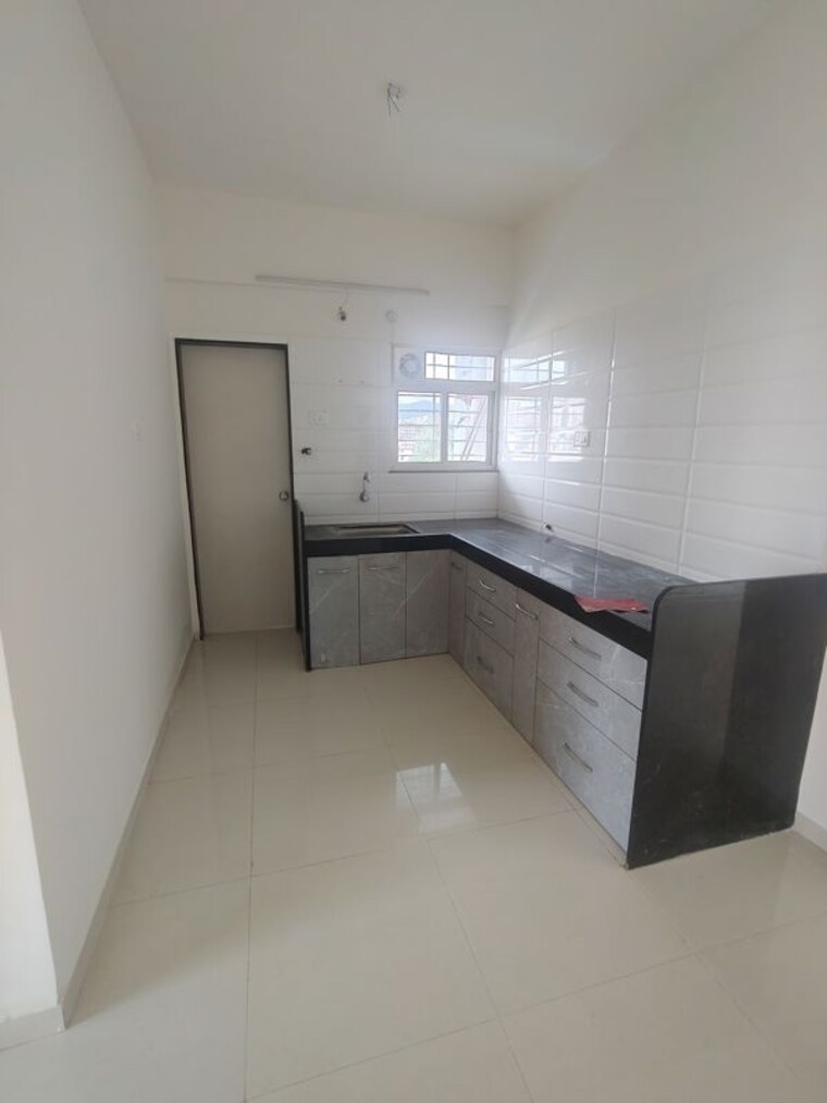 Kitchen, mahesh-el-regalo 2 Bedroom 680 Sq.Ft. Apartment In Undri Pune 10116411