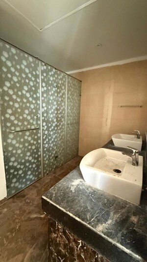 Bathroom in 3.5 BHK Apartment at Mahagun Mezzaria, Sector 78 – for Rent