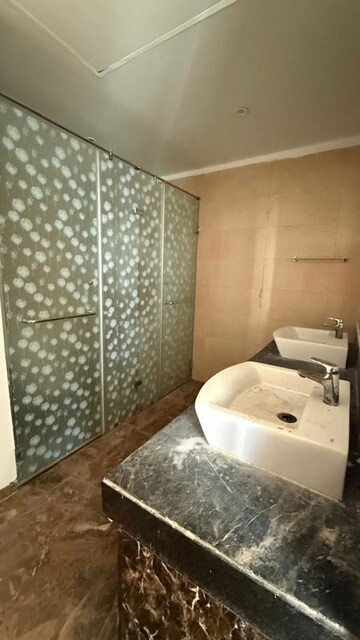Bathroom in 3.5 BHK Apartment at Mahagun Mezzaria, Sector 78 – for Rent