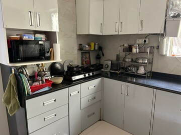 Kitchen in 3 BHK Apartment at Mainland Valencia, Wagholi – for Rent