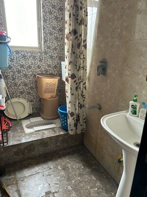 Bathroom in 3 BHK Apartment at Mainland Valencia, Wagholi – for Rent
