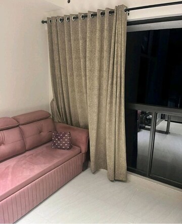 Living Room in 1 BHK Apartment at Lodha Crown Quality Homes, Majiwada – for Rent